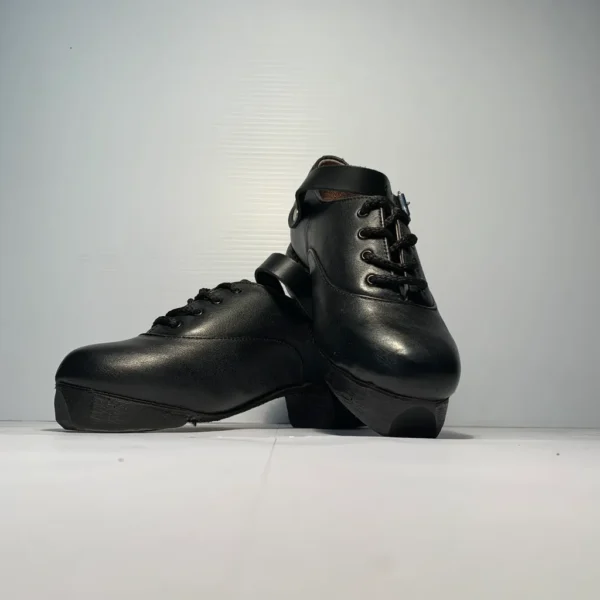 A pair of Ultra Flexi shoes on a white surface.