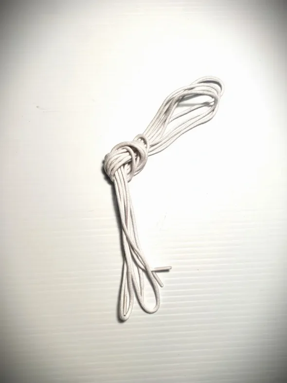 A Gavin by Fays Hard shoe Laces on a white surface.