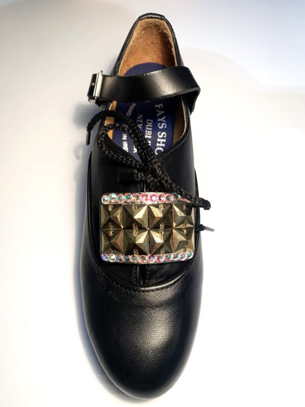 A pair of black shoes with a Mini 8 Square Diamante Buckle and rhinestones.