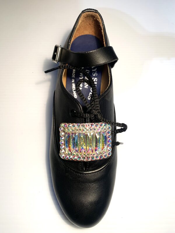A black shoe with a AB Crystal Diamante 6 Bar Buckle.