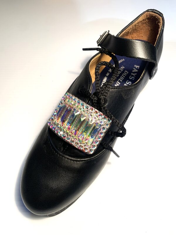 A black shoe with an AB Crystal Diamante 6 Bar Buckle.